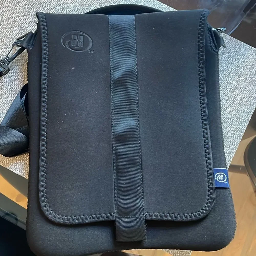 Great neoprene iPad bag.  Great adjustable shoulder strap.  Two pockets!